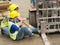 Accident of working man, forklift over leg of engineer. Asian engineer worker man was crushed by a forklift and engineer woman