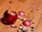 accidentally broken new year red ball, on a wooden floor background and preparation for the new year celebration