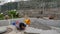 Accidents while cleaning domestic house where a caucasian girl falls off the ladder with broom and dustpan and bucket of water