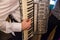 Accordion player on his vintage instrument