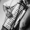 Accordionist plays vintage accordion. Retro stylized