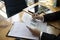 Accountant analyzing financial data on office desk.