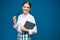 Accountant business woman wearing glasses portrait with book