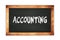 ACCOUNTING text written on wooden frame school blackboard