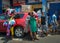 ACCRA,REPUBLIC OF GHANA - APRIL 30,2018:Women sell clothes on the street in front of a shopping center