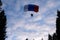 Accuracy skydiving. Skydiver is landing in the forest.