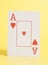 Ace of Heart Playing card on yellow