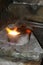 Acetylene torch smelting hot precious metals down