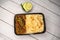 Achari beef pulao biryani rice with cucumber and lemon slice served in dish isolated on wooden table top view of bangladeshi and