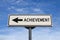 Achievement white road sign with arrow, arrow on blue sky background