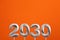 Achievements for the new year 2030 - Silver number on orange foamy