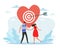 Achieving goal of relationship. Success in love, happy couple man and woman hold hands on dating, arrow hits target