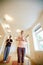 Achieving greater wellbeing with yoga. Low angle shot of two people doing yoga together indoors.