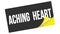 ACHING  HEART text on black yellow sticker stamp