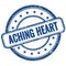 ACHING HEART text on blue grungy round rubber stamp