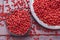 Achiote seed in wooden bowl