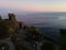 Aci Castello, Italy: view of the interior gardens and the sea at dusk