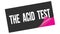 THE  ACID  TEST text on black pink sticker stamp