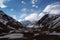 Aconcagua between clouds and mountains