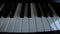 acoustic or digital piano keyboard, black and white piano keys, music equipment