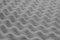 Acoustic foam with a wavy texture. The polyurethane foam used for sound absorption