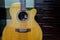 Acoustic guitar against a drawer background