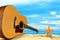 Acoustic guitar on the beach