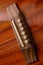 Acoustic Guitar Bridge Metal strings Wooden playing instrument.