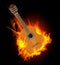 Acoustic guitar in fire flame