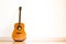 Acoustic guitar isolate white wall background