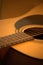 Acoustic guitar photo in cozy, warm tones