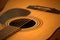 Acoustic guitar photo in cozy, warm tones