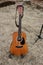 Acoustic Guitar and Straw on a farm