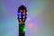 Acoustic guitar wrapped by colorful garland. christmas and new year music gift