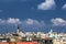 Acre, Israel - 3 of August 2019: The Acre skyline with its landmarks - mosques` domes and minaret and catolic church on hot sunny