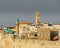 ACRE, ISRAEL - MARCH 23, 2018: View of the old city of Acre, with the clock tower, minarets and mosque.