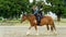 Acrobat formation on a horse, Motueka A and P show