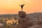 An Acrobat performs acrobatics at the spectacular sunset point at Hampi in Karnataka, India