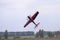 Acrobatic maneuvers. Radio controlled airplane flying in the sky