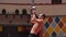 Acrobatic shirtless man training his hands at the circus arena