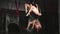 Acrobatic women doing tricks on aerial hoop