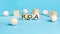 acronym roa on wooden balls, bright blue background