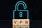 Acronym VPN Virtual Private Network made of wooden cubes on dark background with lock