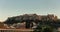 Acropolis of Athens Greece rock and Parthenon on blue sky background in the evening