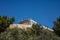 Acropolis of Athens Greece rock and Parthenon on blue sky background, sunny day