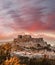 Acropolis with Parthenon temple against sunset in Athens, Greece