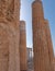 Acropolis, view between columns to the small Ionian style Athena Nike (victorious) ancient temple.