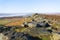 Across the top of Stanage Edge on a cloudless winter morning to the foggy valleys of the Peak District