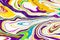 Acrylic paint waves abstract background. Rainbow marble texture. Oil paint liquid flow colorful wallpaper. Creative