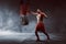 Action of asian boxer man training with punching bag